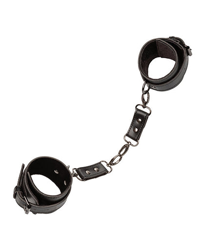 Black wrist hand cuffs with swivel chain links and metal buckle closures